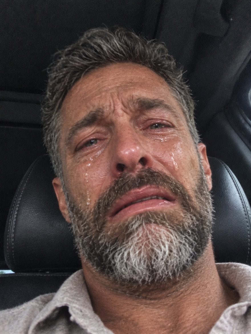 Jake crying in his car